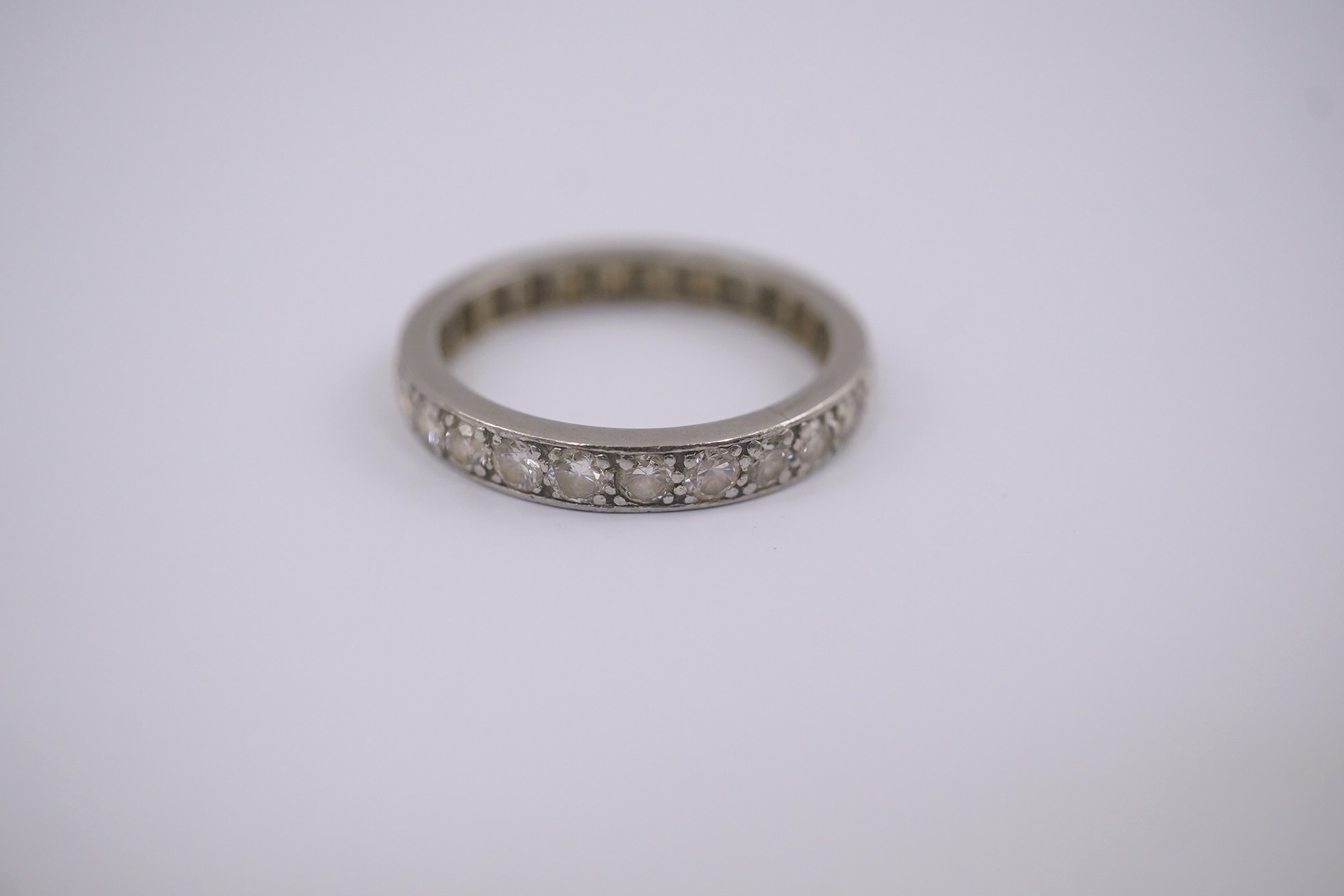 A platinum and diamond set full eternity ring